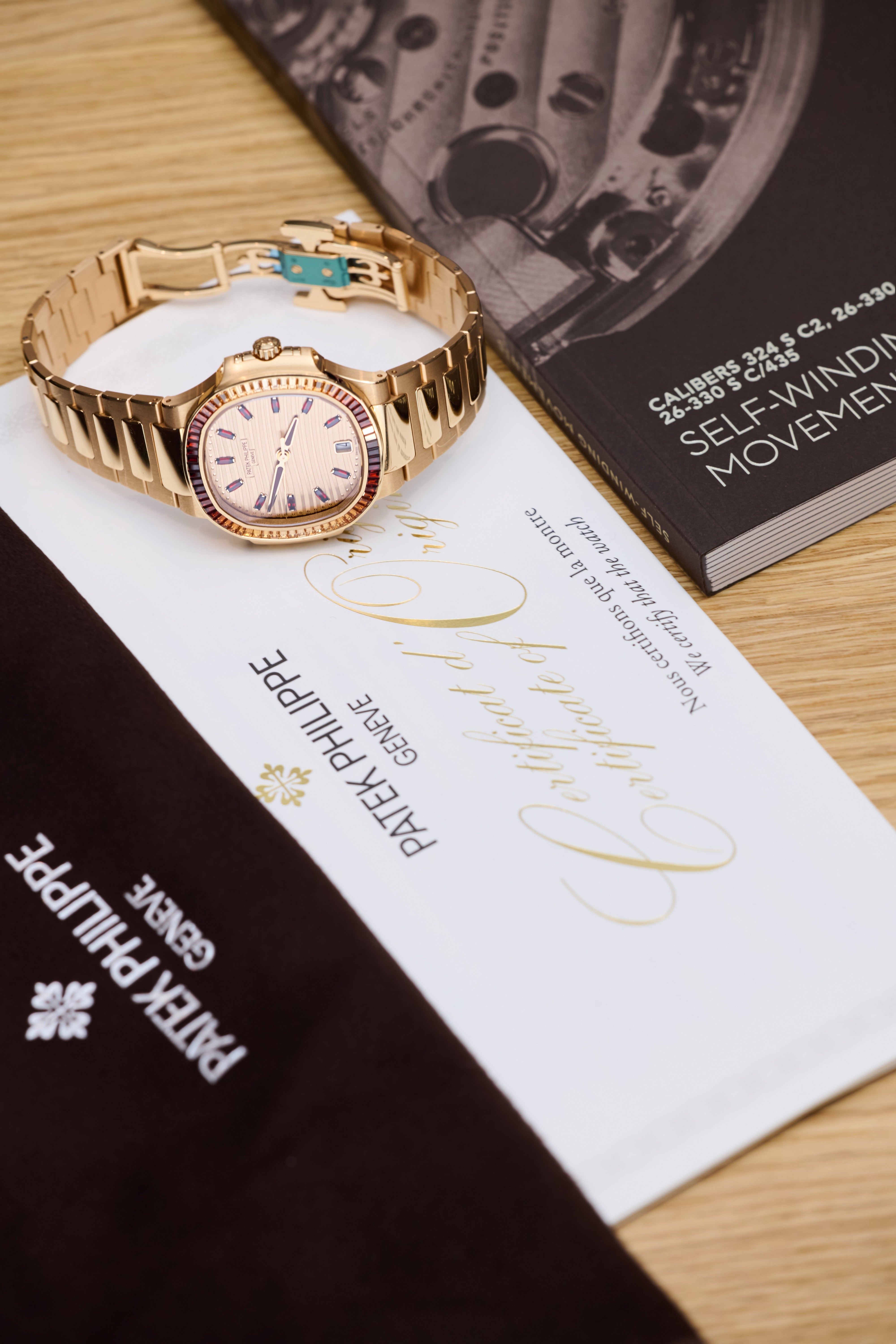 Patek Philippe Ladies Rose Gold Garnets Nautilus