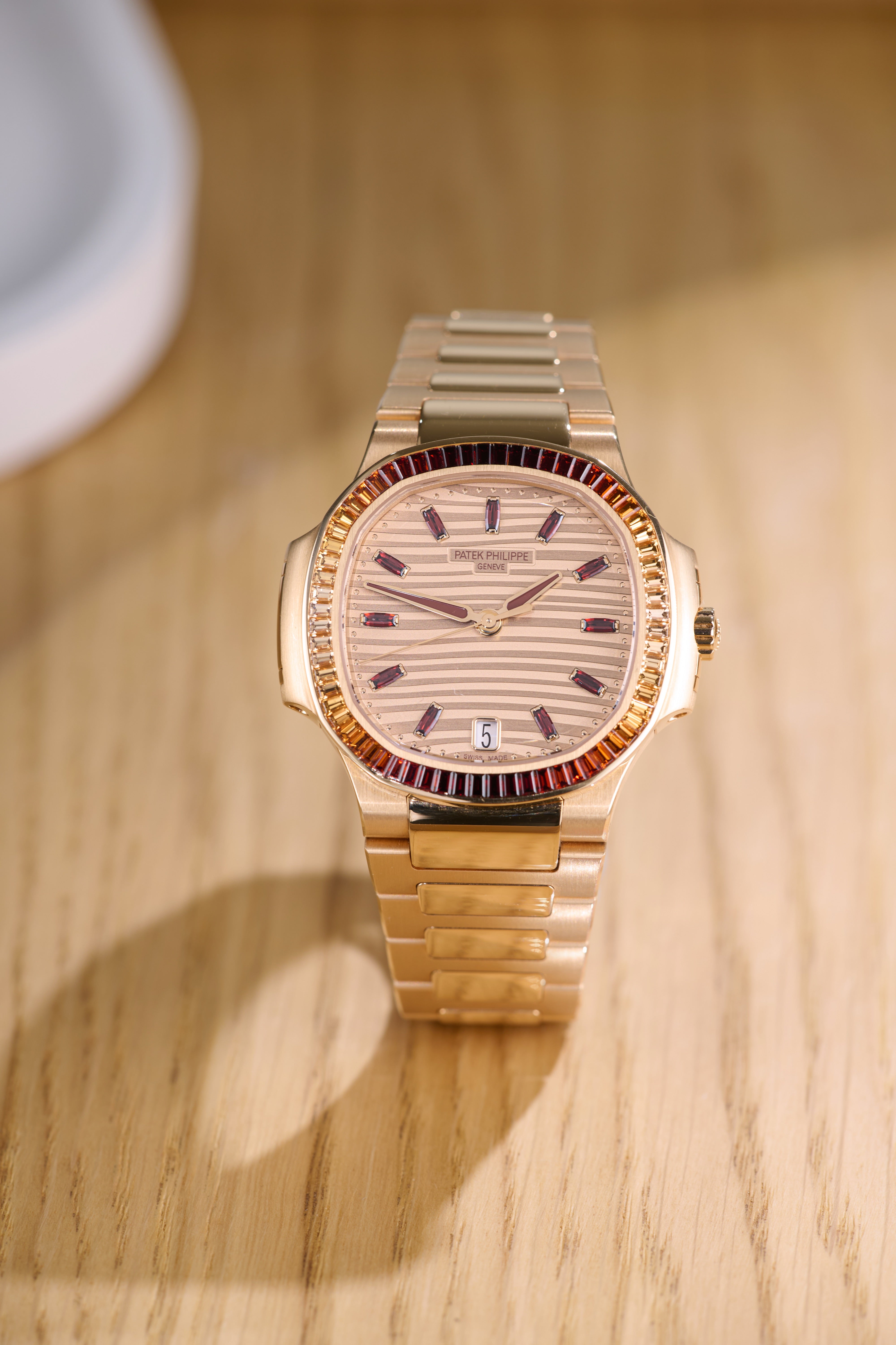 Patek Philippe Ladies Rose Gold Garnets Nautilus