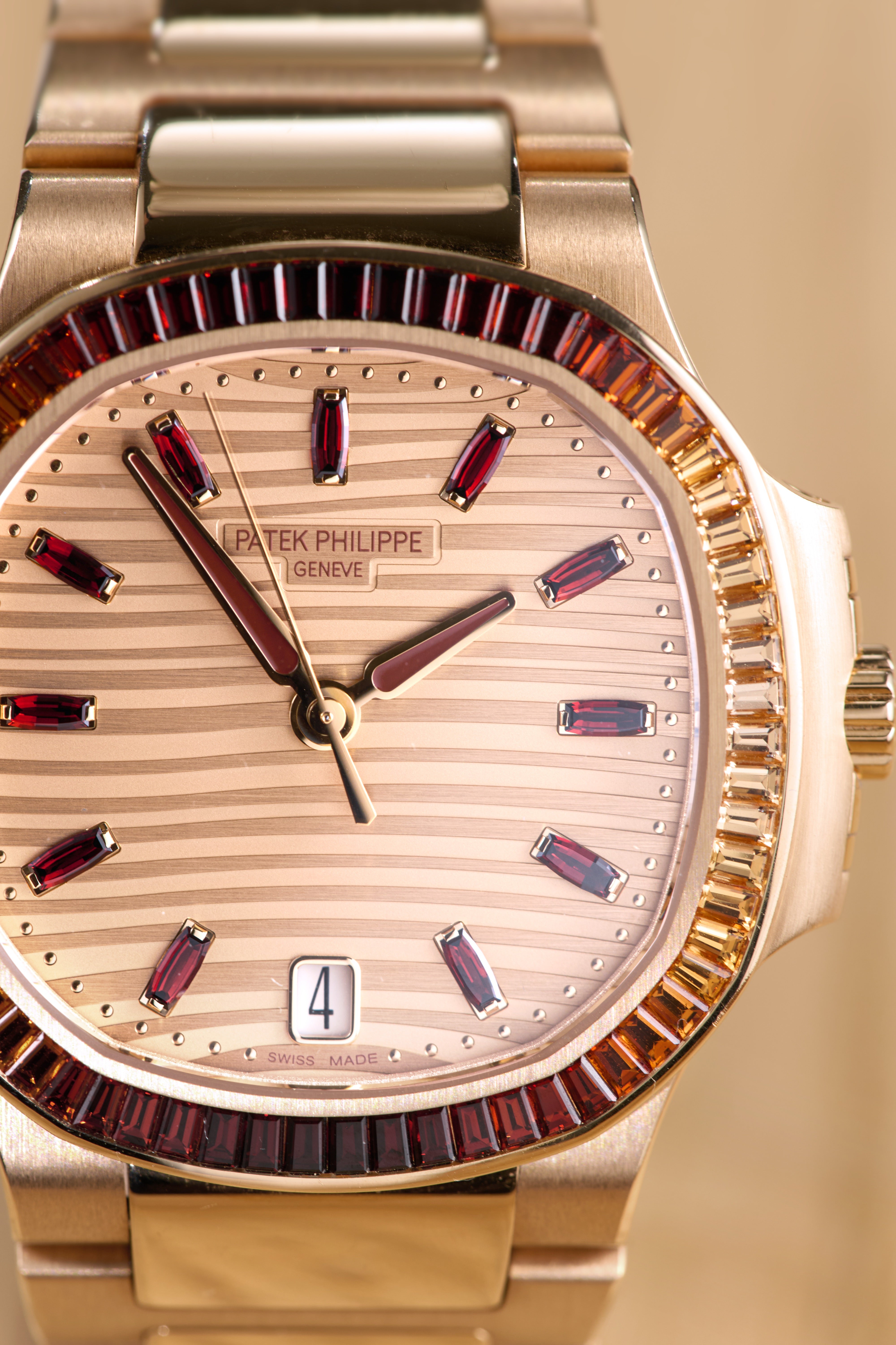 Patek Philippe Ladies Rose Gold Garnets Nautilus