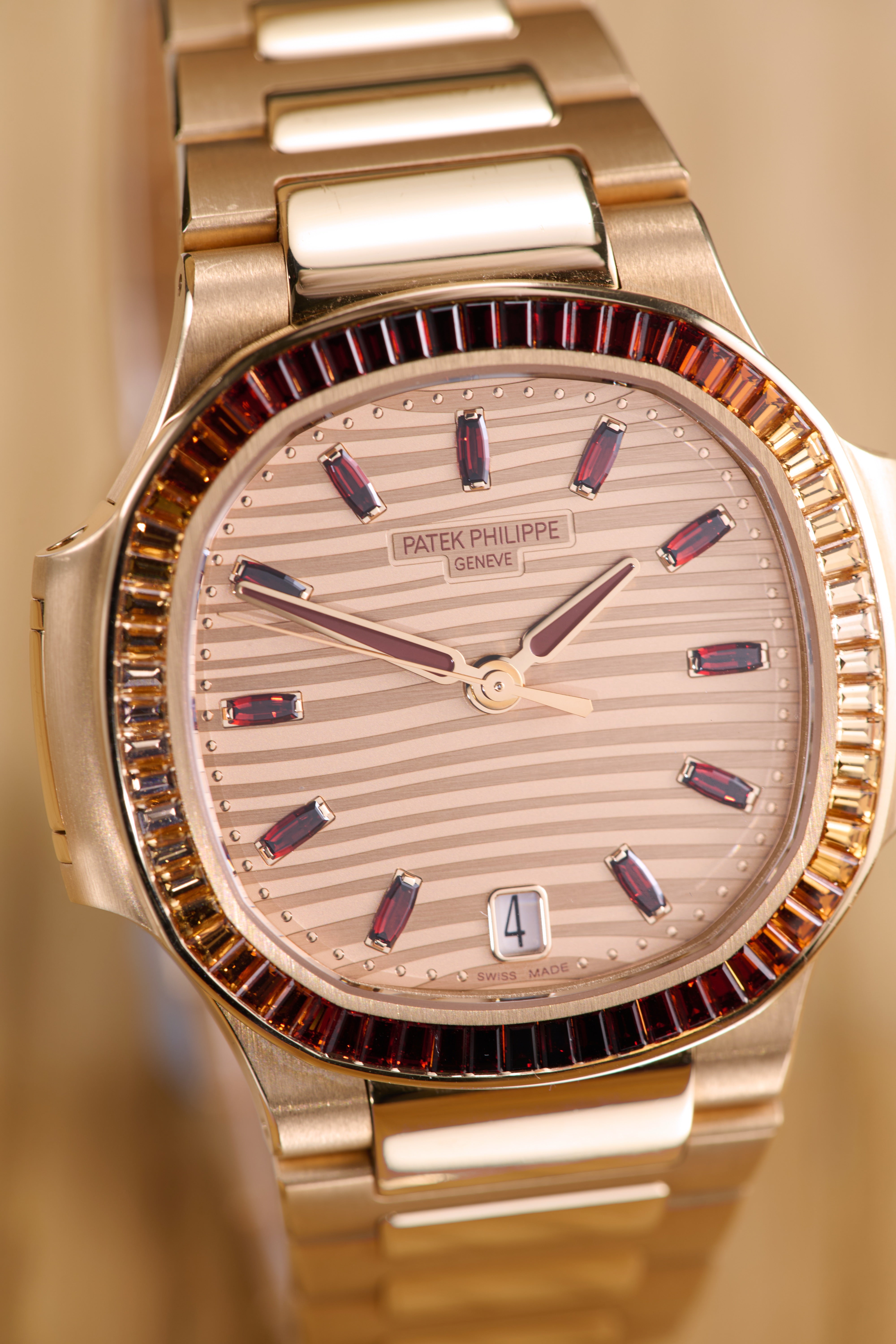 Patek Philippe Ladies Rose Gold Garnets Nautilus