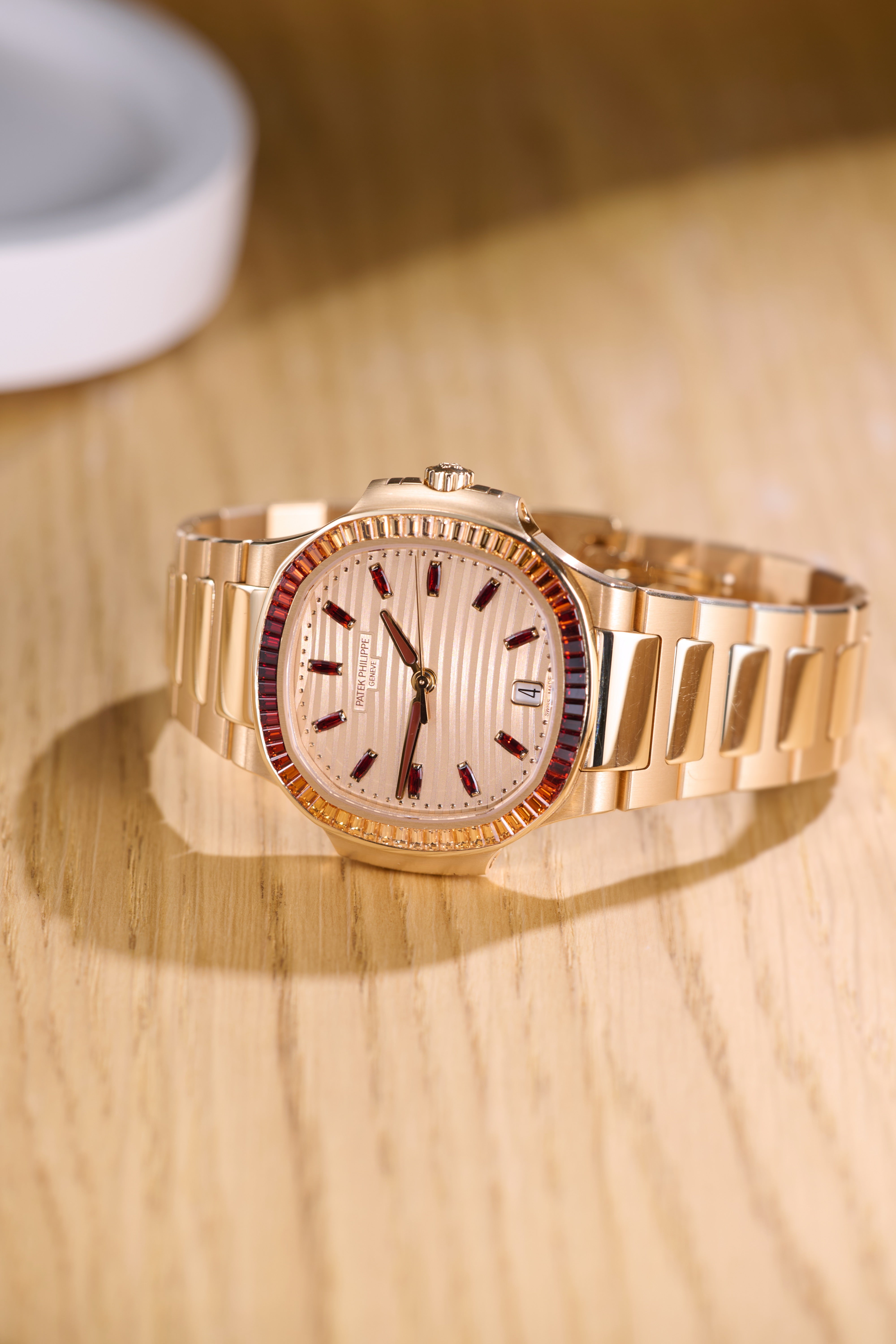 Patek Philippe Ladies Rose Gold Garnets Nautilus