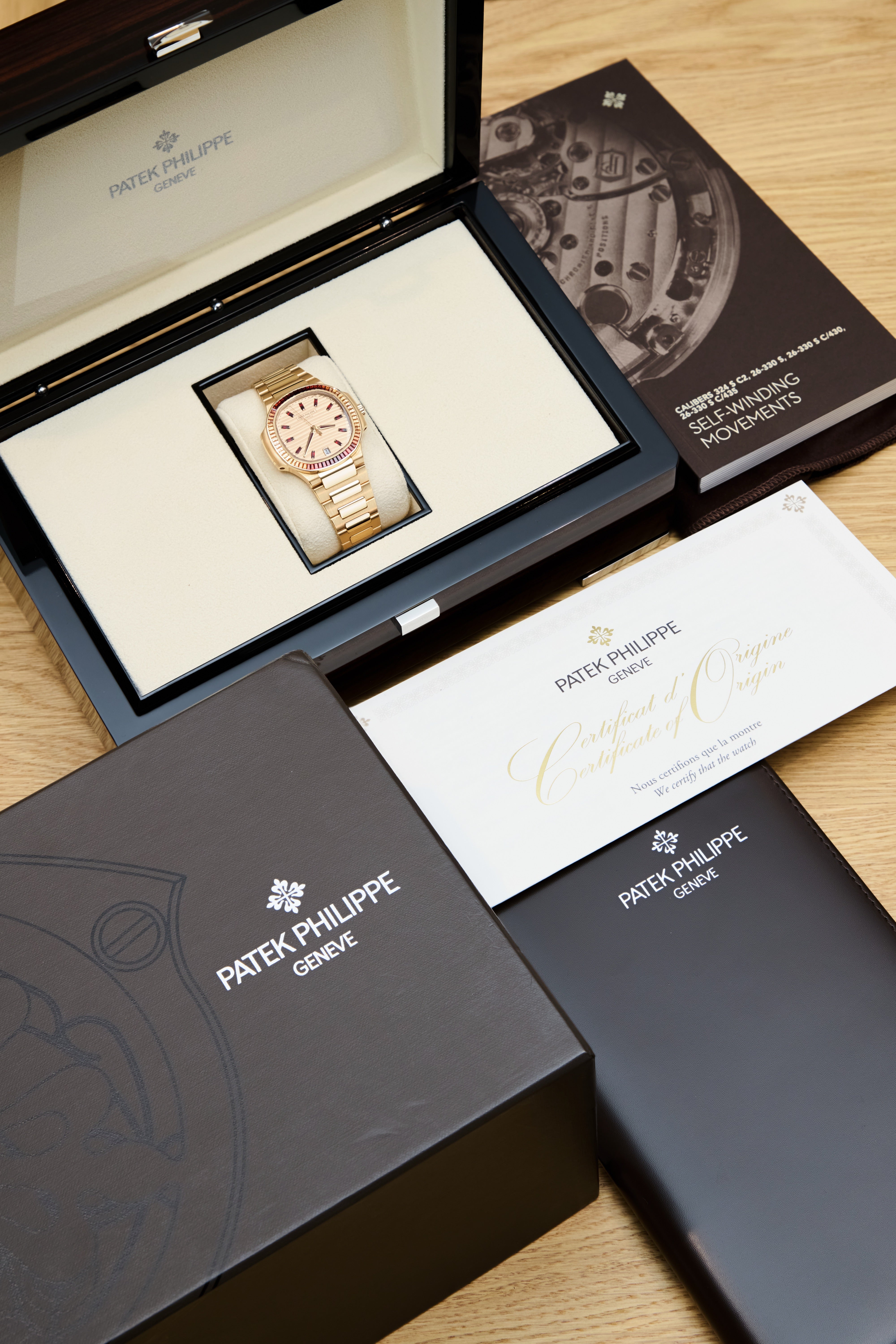 Patek Philippe Ladies Rose Gold Garnets Nautilus