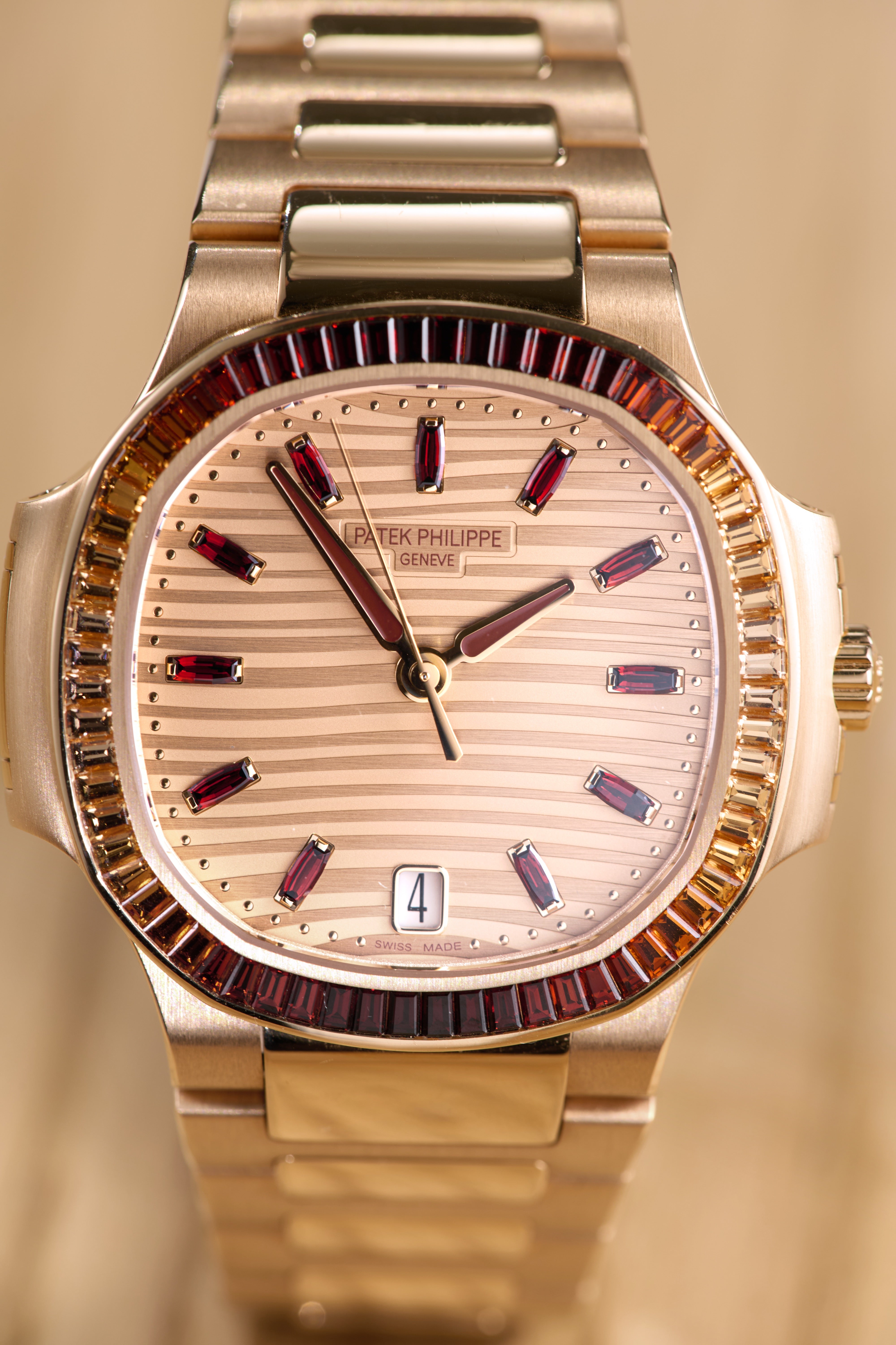 Patek Philippe Ladies Rose Gold Garnets Nautilus