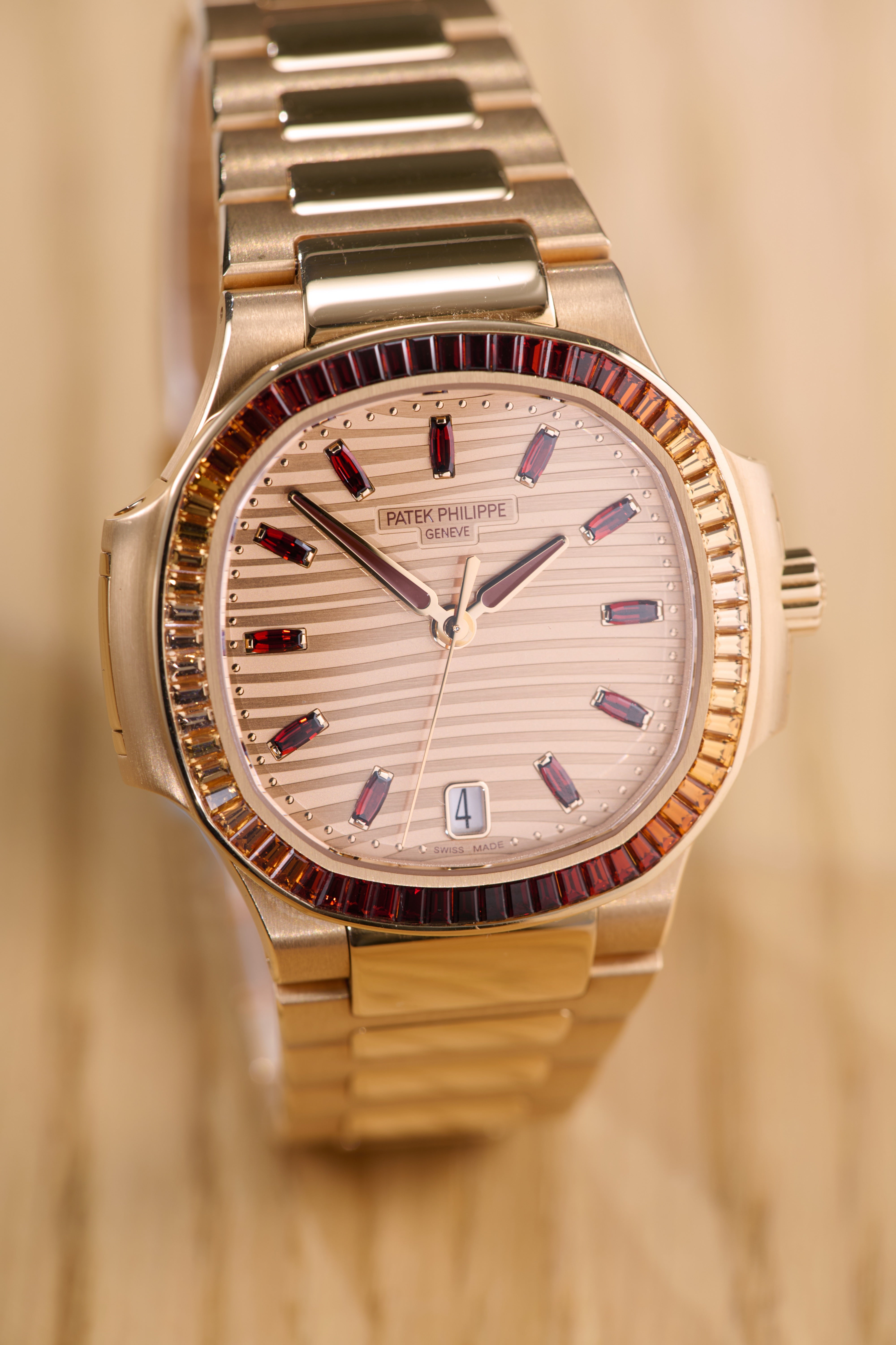 Patek Philippe Ladies Rose Gold Garnets Nautilus